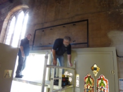 Installing the frame for St Anthony from the scaffold